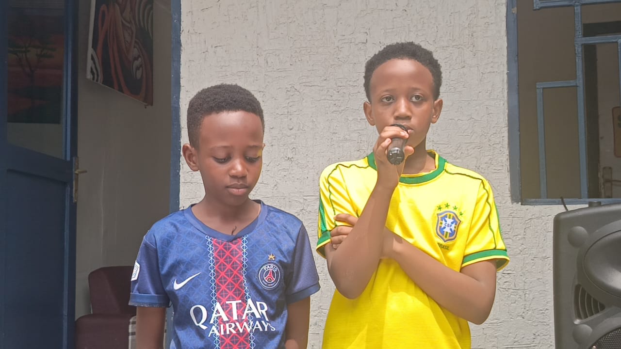 Student practicing public speaking with a microphone