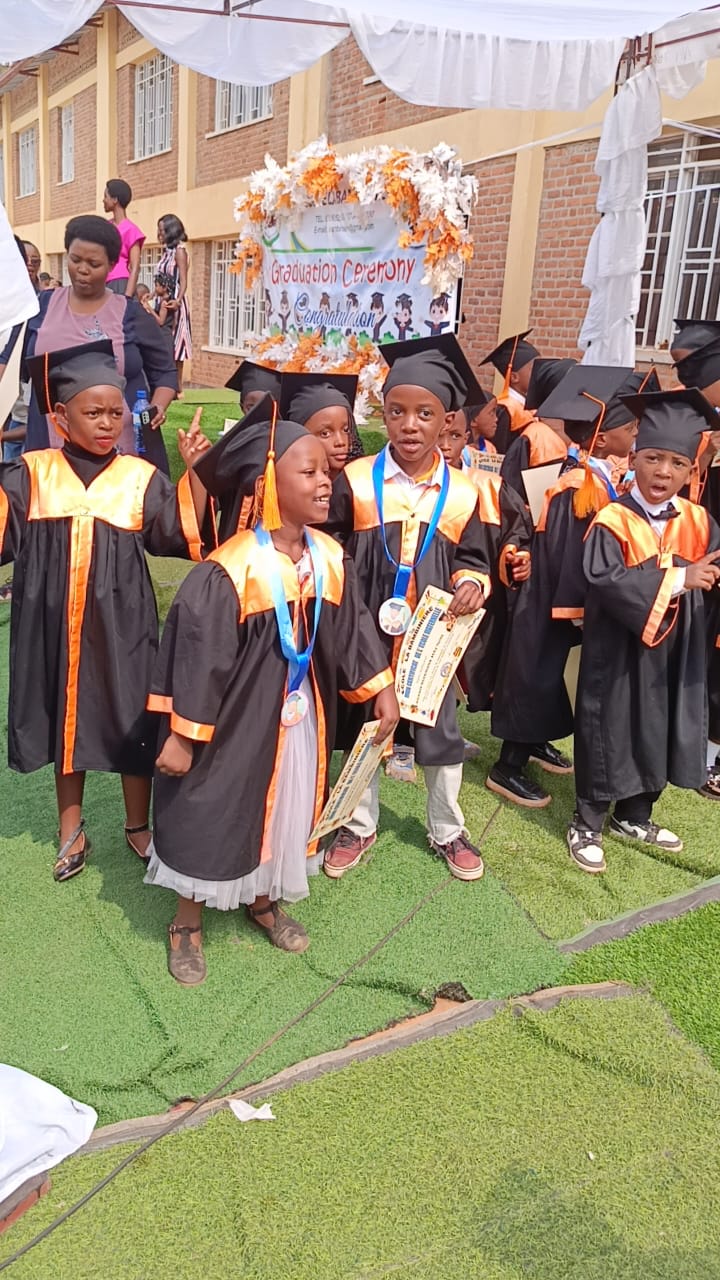 Students in gowns at the graduation ceremony