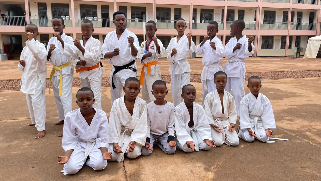 The karate club posing with their instructor